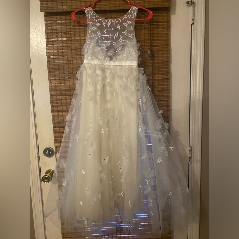 Adorable white flower girl dress, fully lined with white toole skirt